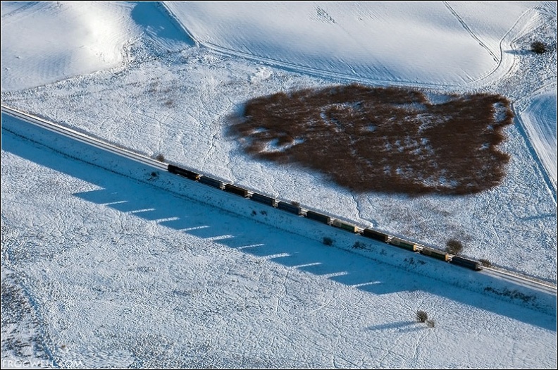 Aerial photo of train in snow